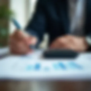 A person reviewing financial documents with a calculator